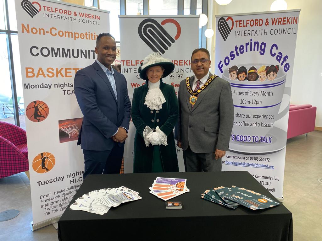 Interfaith Community Basketball display with the Mayor and civic guests at a community event